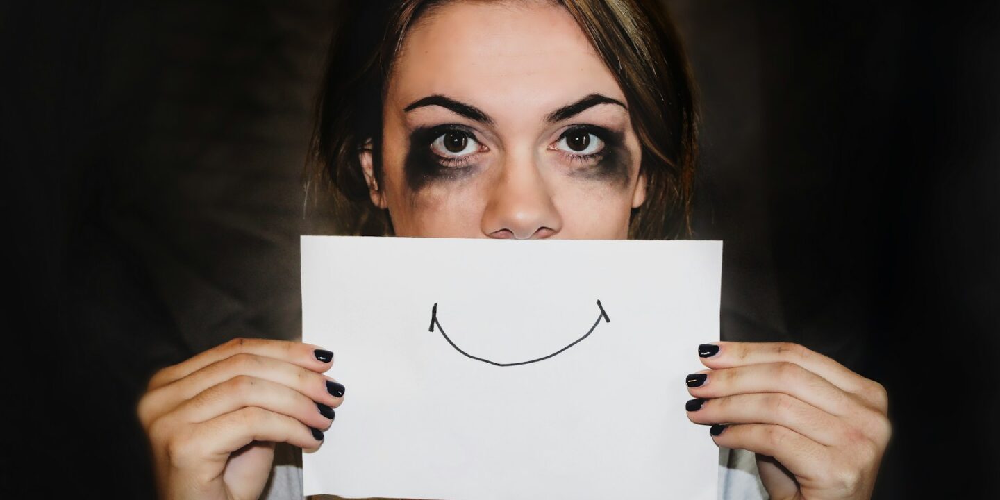 person holding white printer paper