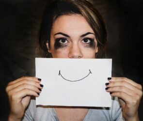 person holding white printer paper